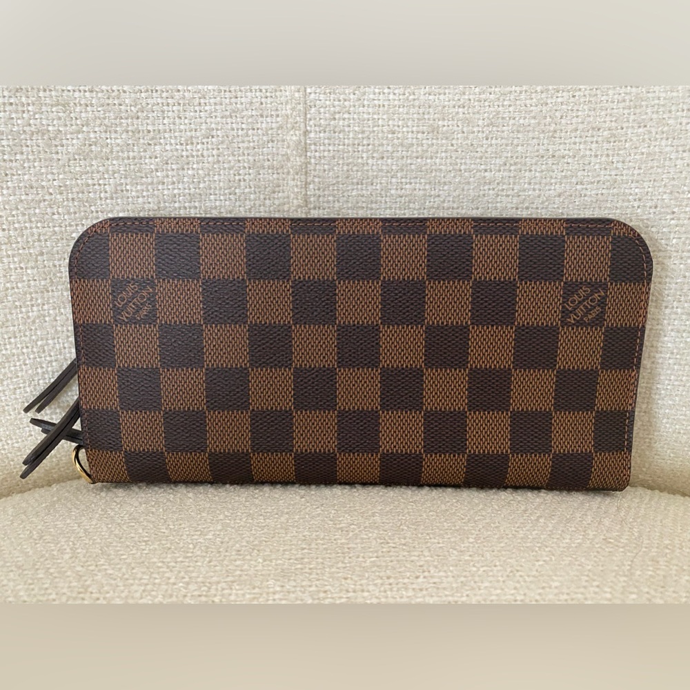 Authentic Louis Vuitton Damier Ebene Insolite Wallet.